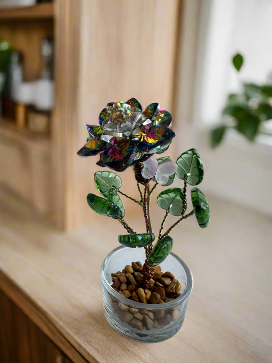 Glass flower in a glass container